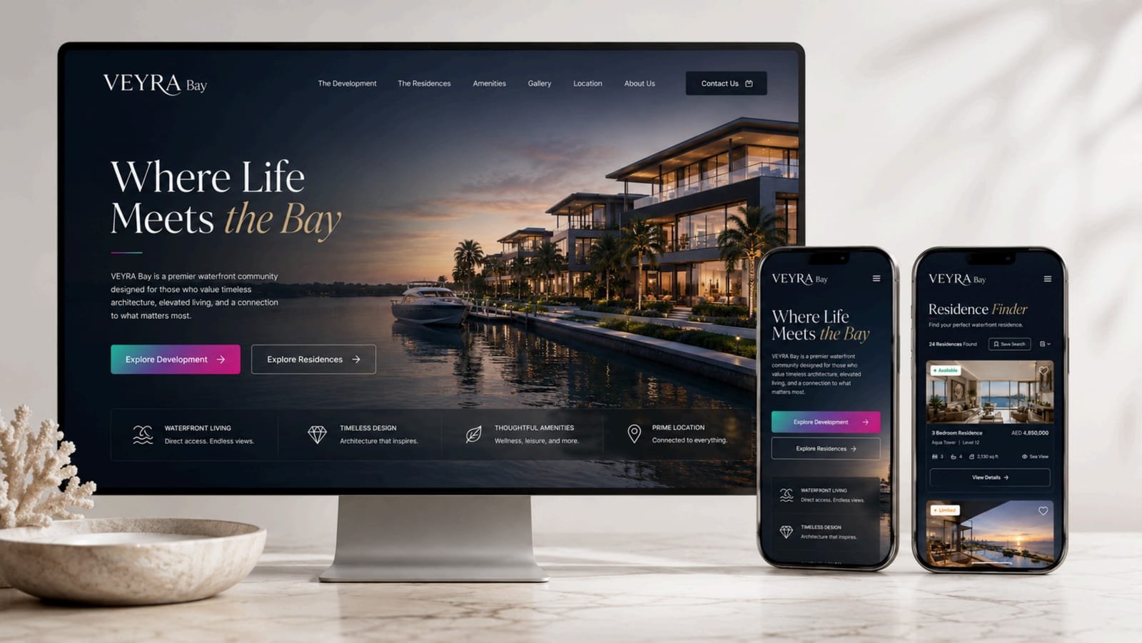 The redesigned VEYRA Bay website on a desktop monitor and two phones